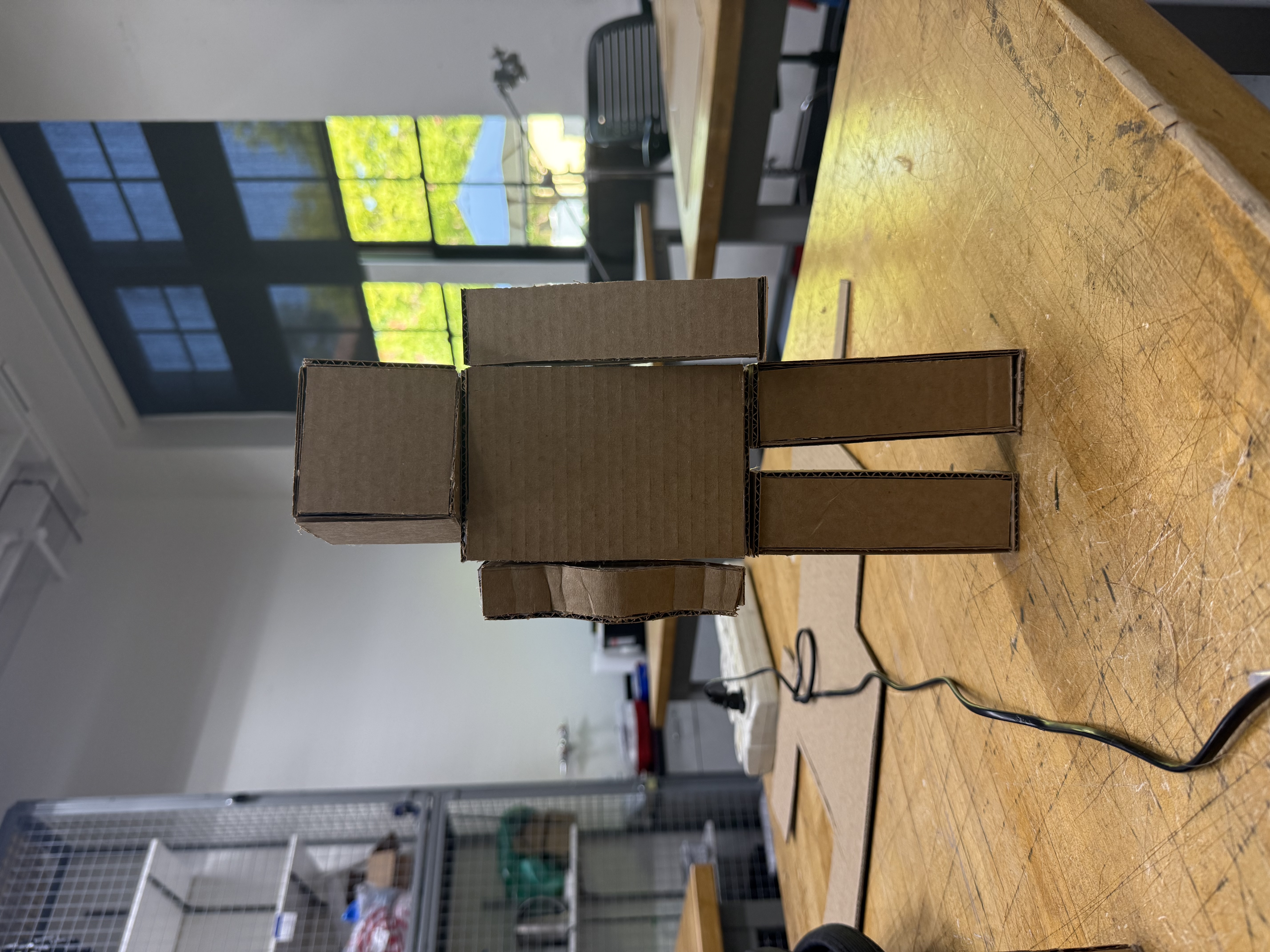 Early cardboard MODU prototype in a workshop