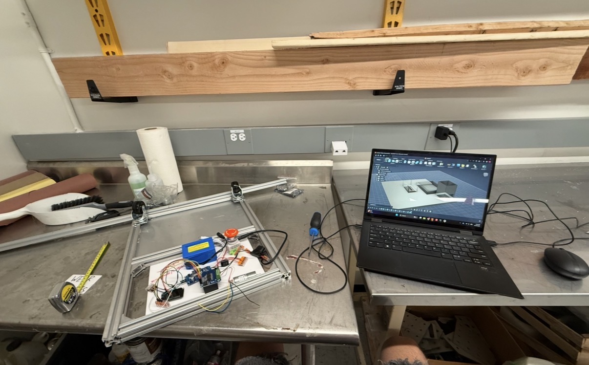 MVP frame and electronics beside an open CAD model